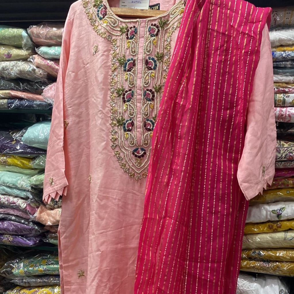 The Three Piece Suit Consists Of Top Bottom And Dupatta